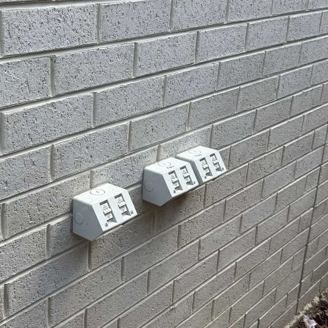 Weatherproof powerpoints installed on an exterior wall