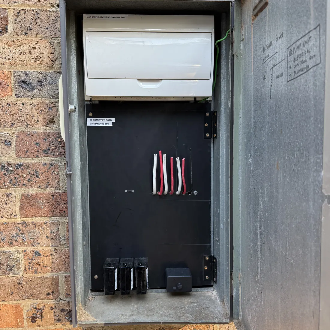 Switchboard opened up to check capacity for a new dedicated circuit